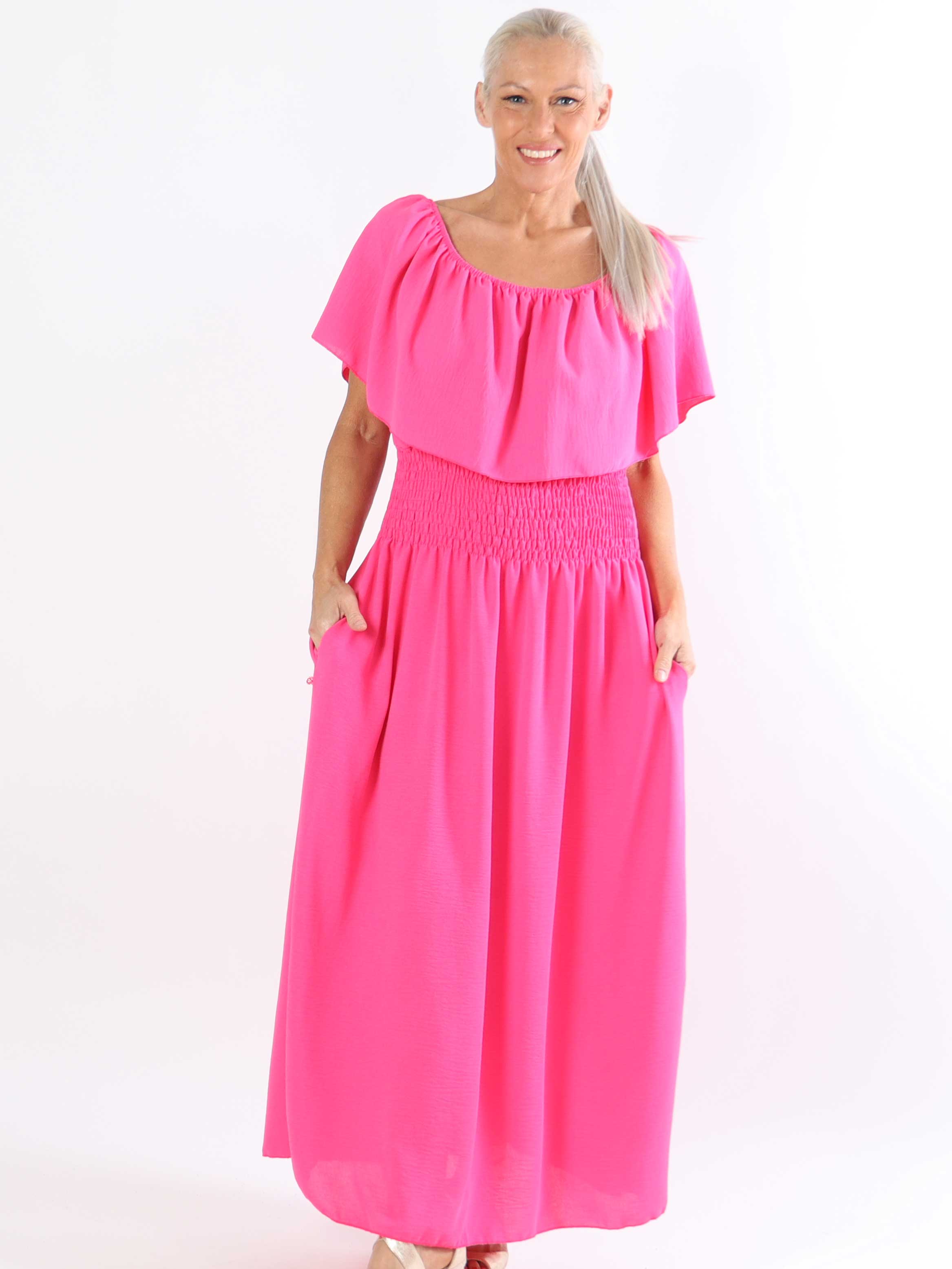 Rachel - Lång plus size-klänning med fickor och volang i nederkanten